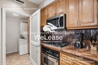 8233 Station Village Ln in San Diego, CA - Building Photo - Building Photo