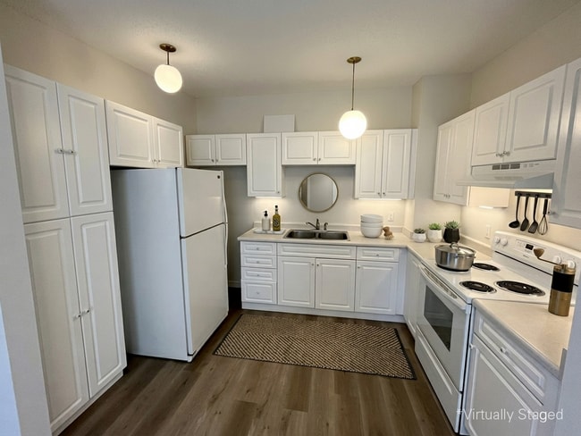 Bowness Village Apartments in Calgary, AB - Building Photo - Building Photo