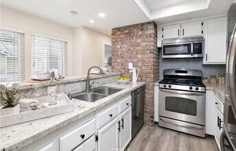 5920 Bedford Ct, Unit The Villages Condominiums in Yorba Linda, CA - Building Photo - Building Photo