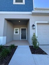 7805 WATERSCAPE Dr in Groveland, FL - Building Photo - Building Photo