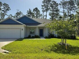 14 Ethan Allen Dr in Palm Coast, FL - Building Photo