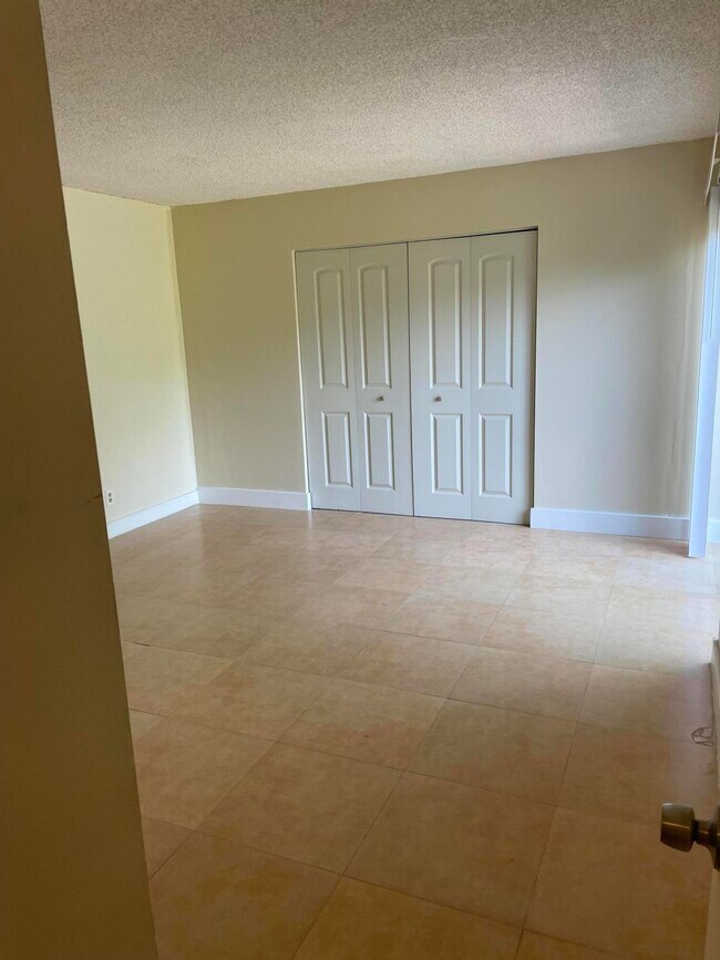 6434 Red Pine Ln-Unit -A in Greenacres, FL - Building Photo - Building Photo