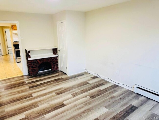 property at 762 E 211th St