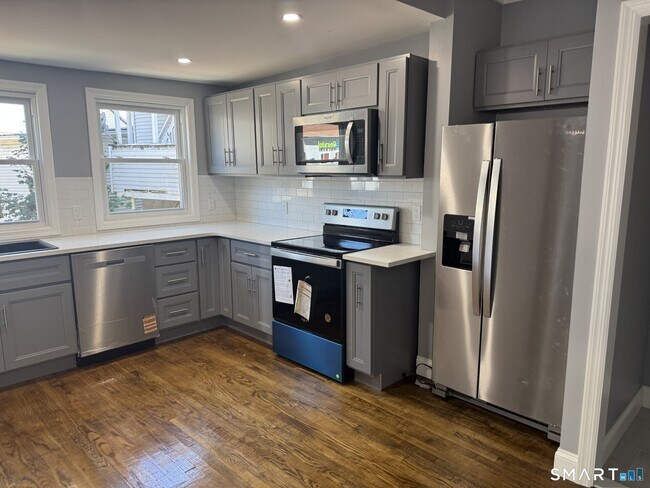 property at 8 Bridgeport Ave
