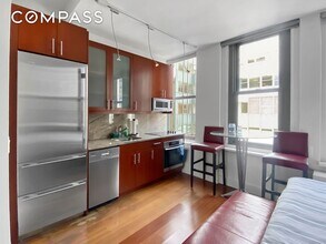 80 John St, Unit 16D in New York, NY - Building Photo - Building Photo