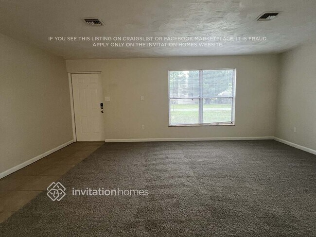 411 W Charlotte Ave in Eustis, FL - Foto de edificio - Building Photo