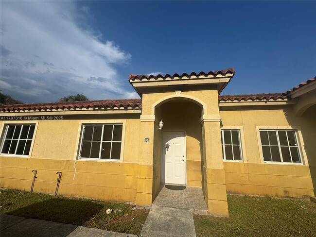 property at 91 NE 13th St