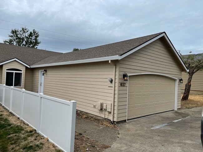 property at 627 NW Meadows Dr