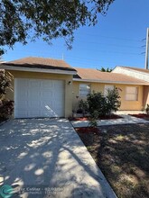 5595 Kimberton Way in Greenacres, FL - Building Photo - Building Photo