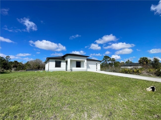 517 Johns Ave in Lehigh Acres, FL - Building Photo - Building Photo