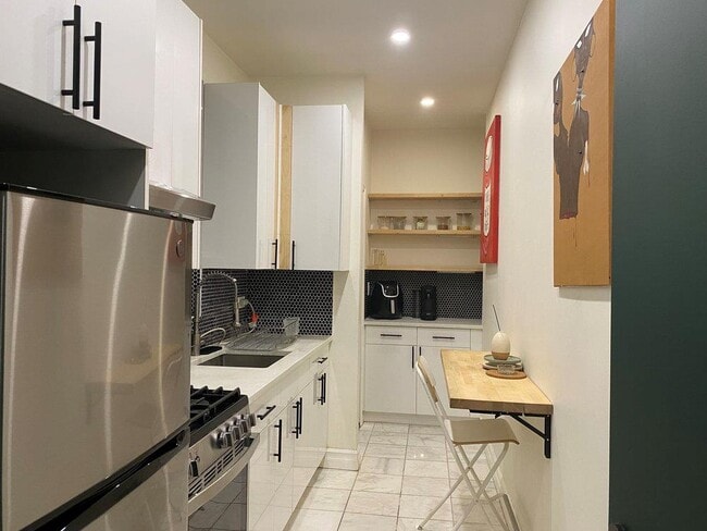 property at 318 E 151st St