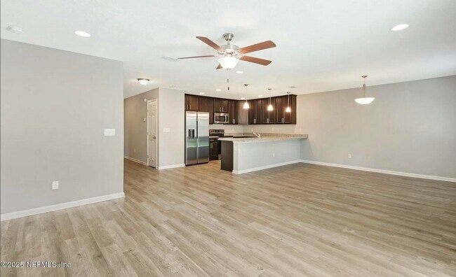 property at 4649 Woolman Ave