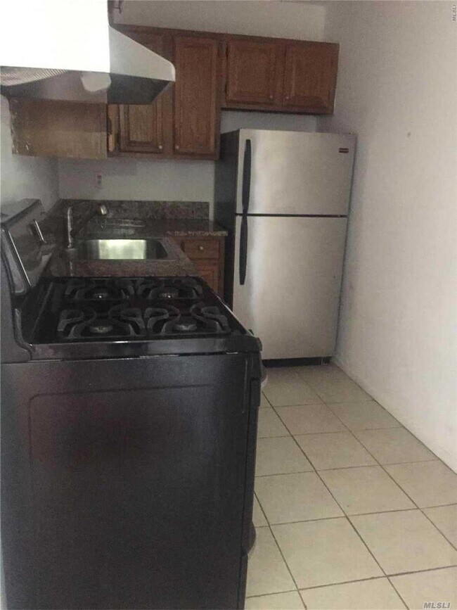 410 Jericho Turnpike-Unit -2C in New Hyde Park, NY - Building Photo - Building Photo