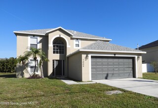 1009 SE Bywood Ave in Port St. Lucie, FL - Building Photo - Building Photo