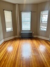 46 Wildwood St, Unit 1 in Boston, MA - Foto de edificio - Building Photo