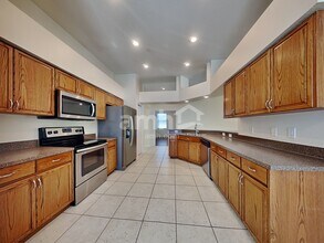 4553 Marchmont Blvd in Land O Lakes, FL - Foto de edificio - Building Photo