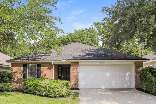 property at 1703 Canopy Oaks Dr