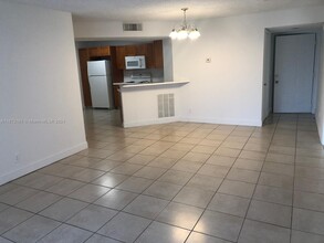 8977 Wiles Rd, Unit 105 in Coral Springs, FL - Building Photo - Building Photo