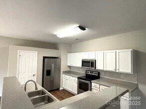 2039 Moss Creek Dr in Harrisburg, NC - Building Photo - Building Photo