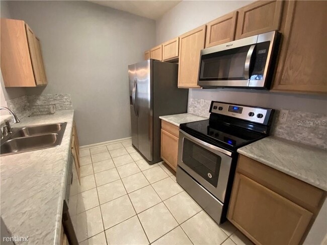7123 Yacht Basin Ave-Unit -Apt 310 in Orlando, FL - Building Photo - Building Photo