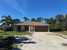 402 Banfield Pl in Lehigh Acres, FL - Building Photo