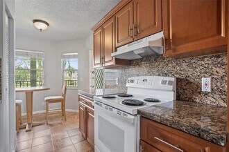 12900 SW 13th St, Unit 212E in Pembroke Pines, FL - Building Photo - Building Photo