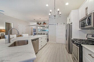 17819 Modena Rd in Miromar Lakes, FL - Building Photo - Building Photo