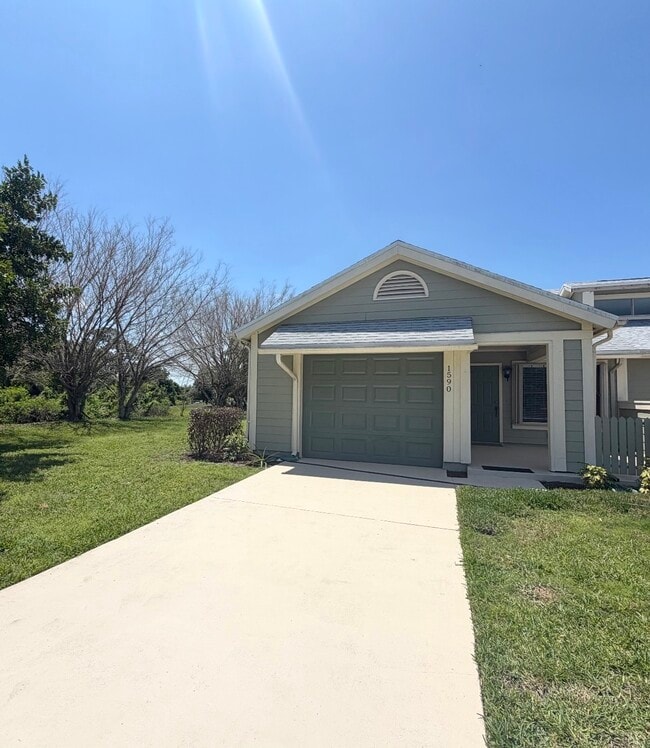 property at 1590 SE Dewberry Ct