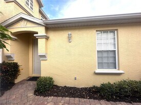 14907 Sterling Oaks Dr in Naples, FL - Building Photo