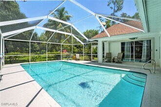 5891 Golden Oaks Ln in Naples, FL - Building Photo - Building Photo