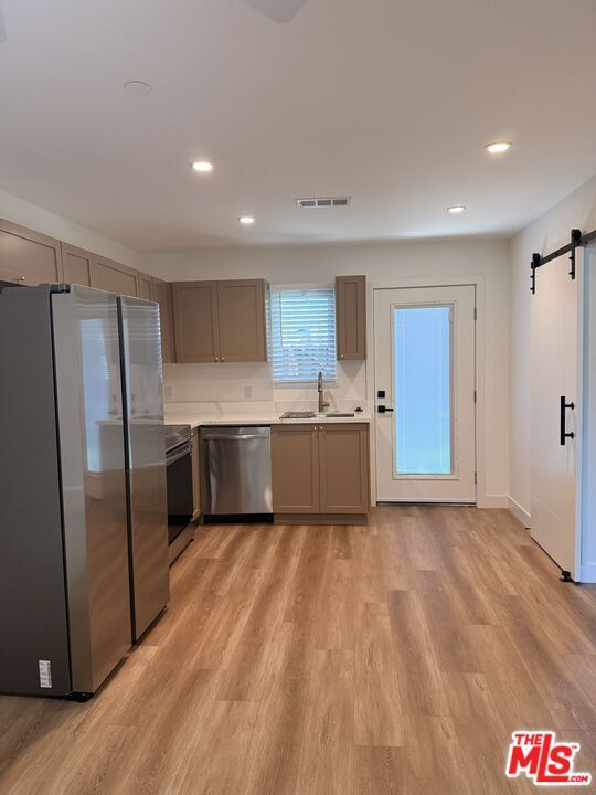 property at 6626 1/2 Woodlake Ave