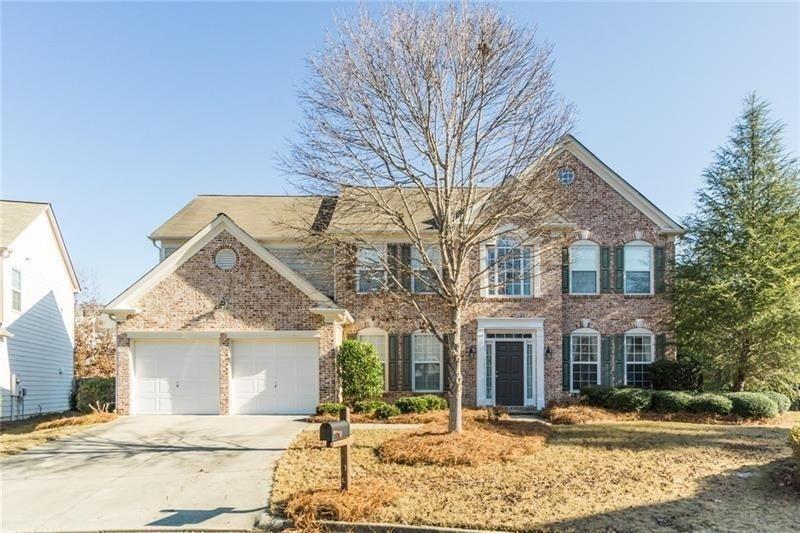 4987 Rustic Canyon Dr in Suwanee, GA - Foto de edificio