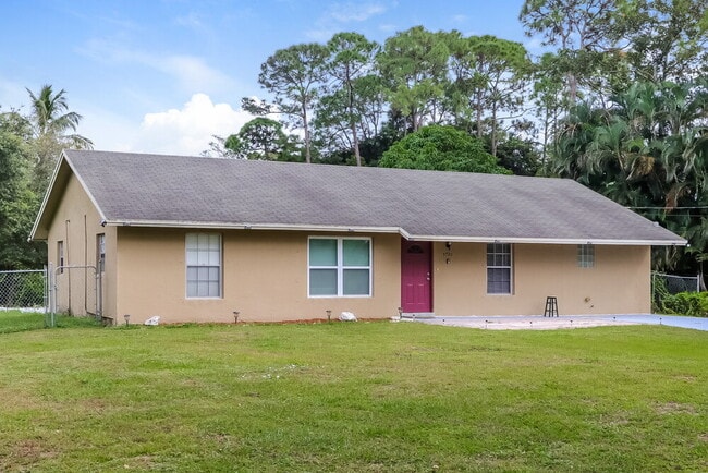 property at 5720 Royal Palm Beach Blvd