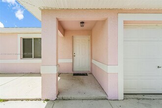 2412 Millie Ave S in Lehigh Acres, FL - Building Photo - Building Photo