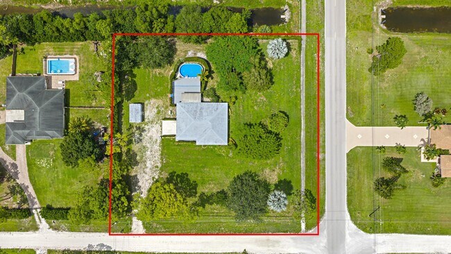 18523 42nd Rd N in The Acreage, FL - Building Photo - Building Photo