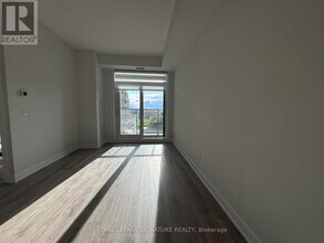 4130 Parkside Village Dr in Mississauga, ON - Building Photo - Building Photo