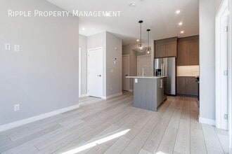 6 Merganser Dr W in Chestermere, AB - Building Photo - Building Photo