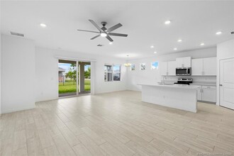 2731 NE Breezeway Cir in Ocean Breeze, FL - Building Photo - Building Photo