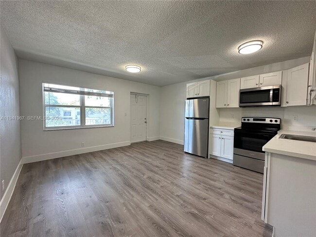 property at 3660 NE 11th Ave