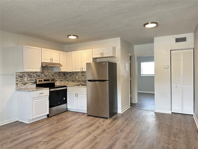 property at 3660 NE 11th Ave