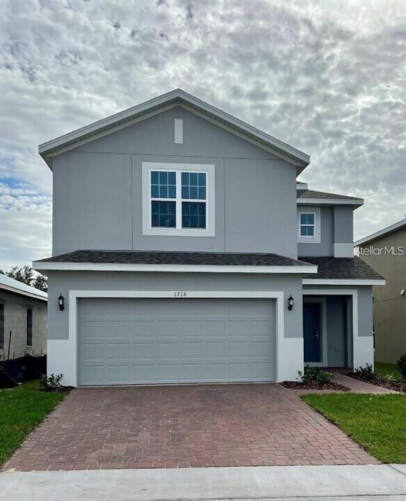 1718 Tree Shade Dr in Davenport, FL - Foto de edificio