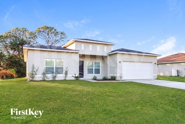 518 White Plains Ave SW in Palm Bay, FL - Foto de edificio - Building Photo