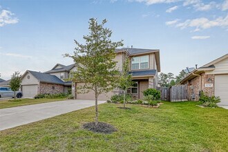 1234 Blue Hazel Ct in Pinehurst, TX - Building Photo - Building Photo