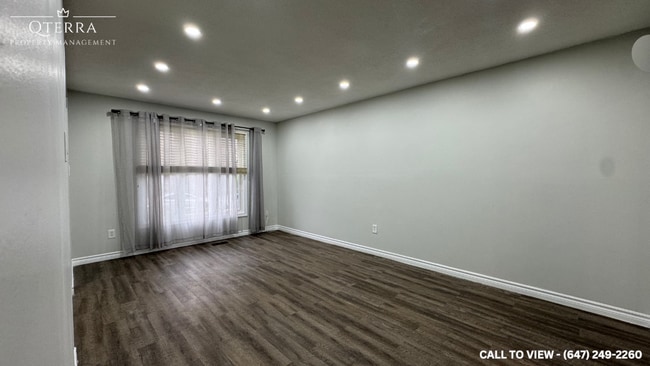 property at 55 Woodlawn Av