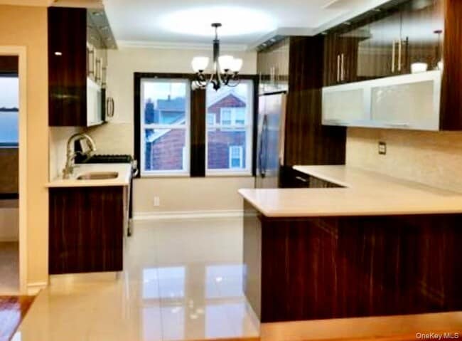 property at 99-15 Ascan Ave