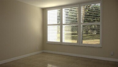 2600 S Course Dr, Unit 104 in Pompano Beach, FL - Building Photo - Building Photo