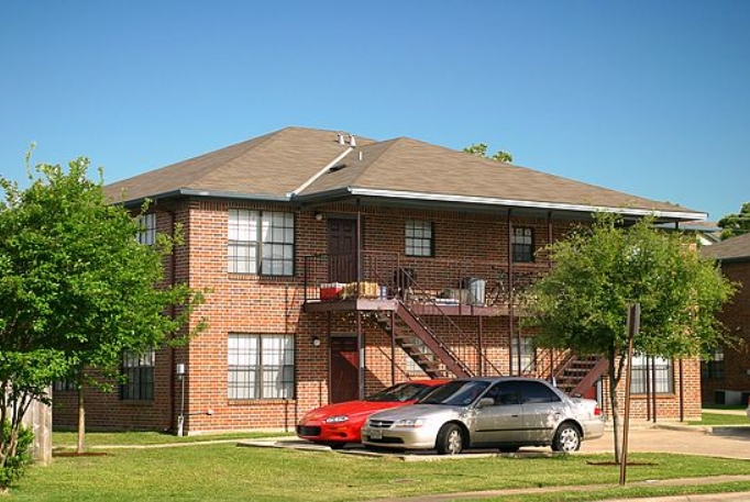 Woodsman Apartments in College Station, TX - Building Photo