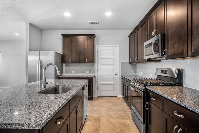 311 Chesterfield Dr in Kyle, TX - Building Photo - Building Photo