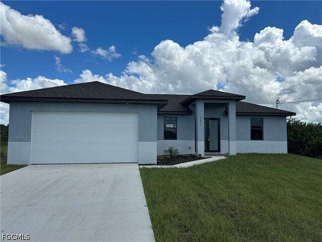 1051 Eisenhower Blvd in Lehigh Acres, FL - Building Photo - Building Photo