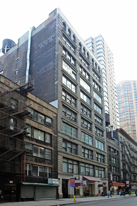 109-115 W 26th St in New York, NY - Building Photo